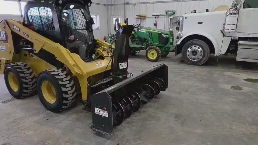 CAN Pro operates a Bobcat Snow Blower on a Caterpillar