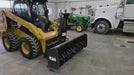 CAN Pro operates a Bobcat Snow Blower on a Caterpillar